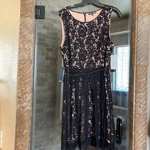 Beautiful black lace dress perfect for evening event.